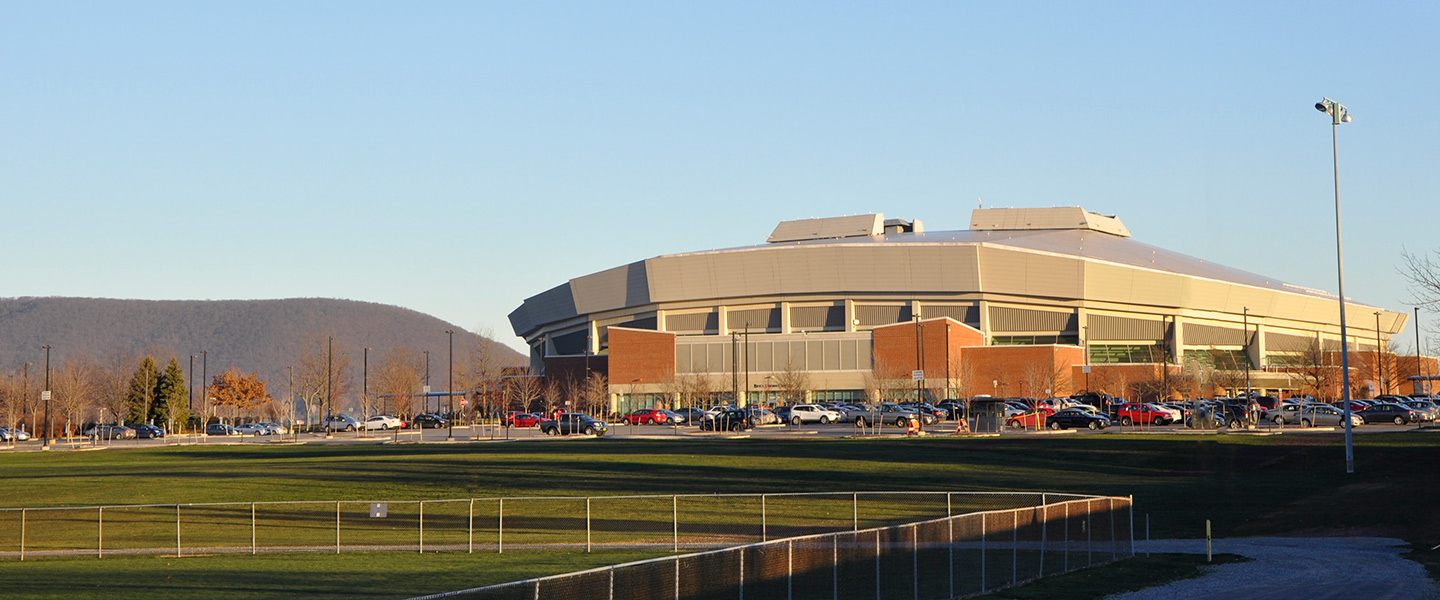 view of the Bryce Jordan Center from Jeffrey Field
