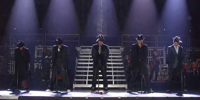 New Kids On The Block perform their song "Please Don't Go Girl" at the Bryce Jordan Center in 2009.
