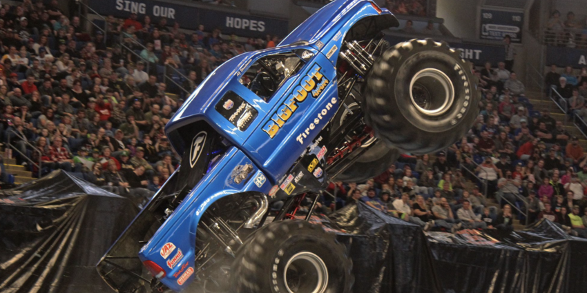 Monster Truck, BIGFOOT, does a wheelie on the arena floor of the BJC