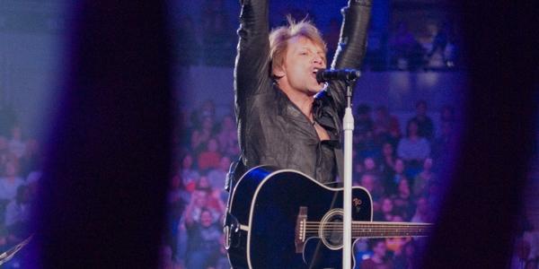 Singer Jon Bon Jovi interacts with the crowd inside the Bryce Jordan Center as he & band perform on stage at the BJC. 