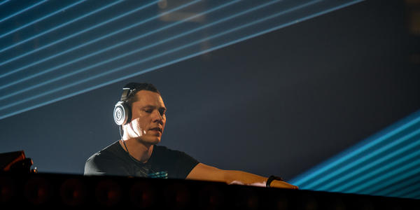 DJ Tiesto plays his electric dance music for the Bryce Jordan Center audience in 2013.