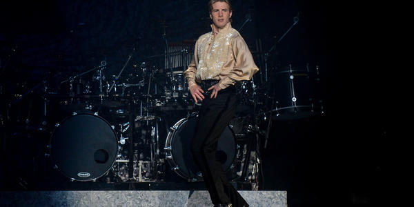 Male dancer mid jump during the Riverdance performance at the Bryce Jordan Center.