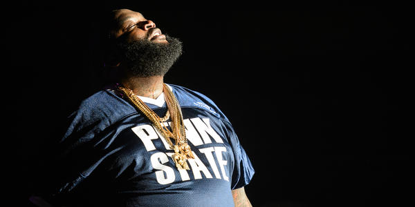 Rick Ross sans shades, looks towards the ceiling with closed eyes at the BJC in 2012.