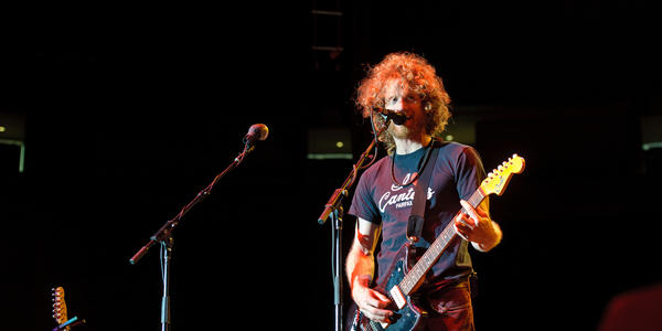 Chad Stokes Urmston plays guitar and sings during Dispatch concert at the Bryce Jordan Center in 2011.