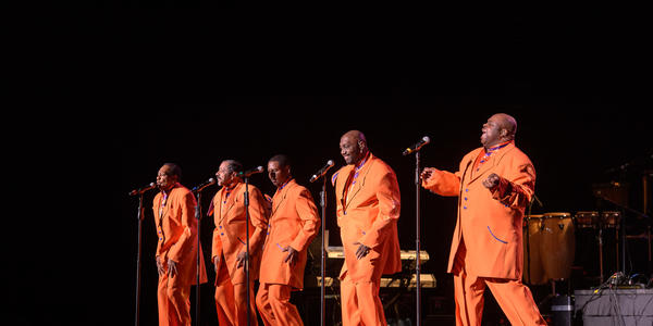 During their encore, The Temptations & The Four Tops perform "I Can't Help Myself" for the audience at the Bryce Jordan Center.