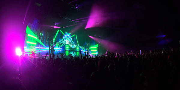 ZEDD, DJ from Germany, performs for the BJC crowd amongst flashing magenta, green & blue strobe lights.