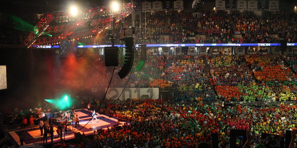 THON side stage wide view of arena floor and seats during concert in 2011.