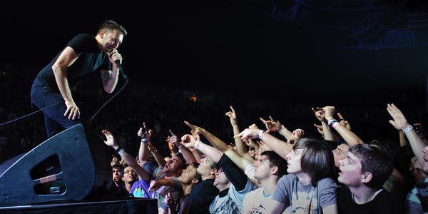 Lead singer from Rise Against, sings to the fans in the front row of the Bryce Jordan Center. 