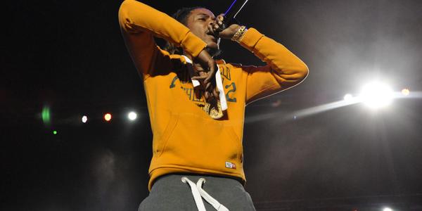 Fetty Wap raps into handheld microphone to the packed crowd at the BJC in 2016.